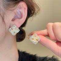 1 Pair Elegant Flower Inlay Copper Zircon Ear Studs main image 1