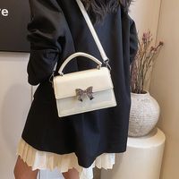 Women's Medium Pu Leather Solid Color Bow Knot Basic Square Magnetic Buckle Crossbody Bag main image 5
