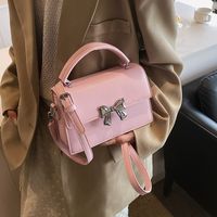 Women's Medium Pu Leather Solid Color Bow Knot Basic Square Magnetic Buckle Crossbody Bag main image 4