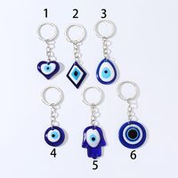 Cartoon Style Modern Style Devil's Eye Heart Shape Rhombus Alloy Glass Bag Pendant Keychain main image 1