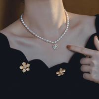 Estilo De Hadas Elegante Dulce Forma De Corazón Cobre Enchapado Perlas De Concha Chapados en oro de 18k Mujeres Collar Colgante main image 3