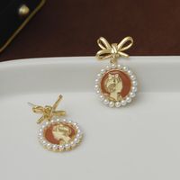 1 Pair Vacation Simple Style Bow Knot Inlay Copper Pearl 18K Gold Plated Drop Earrings main image 4