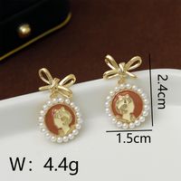 1 Pair Vacation Simple Style Bow Knot Inlay Copper Pearl 18K Gold Plated Drop Earrings sku image 1