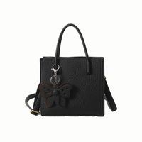 Women's Medium Pu Leather Solid Color Butterfly Classic Style Zipper Tote Bag sku image 1