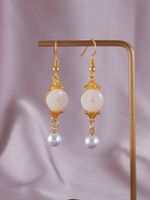 1 Pair Simple Style Classic Style Solid Color Patchwork Hollow Out Synthetic Gemstones Imitation Pearl Alloy Resin Zircon Drop Earrings sku image 2