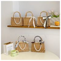 Women's Medium Wicker Bow Knot Vacation String Handbag main image 1