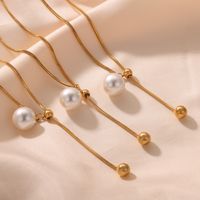Elegant French Style Simple Style Round Artificial Pearl Titanium Steel Asymmetrical 18K Gold Plated Women's Pendant Necklace Long Necklace main image 1