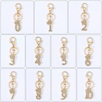 Basic Modern Style Commute Number Alloy Plating Inlay Rhinestones Bag Pendant Keychain main image 4