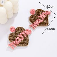 1 Pair Elegant Simple Style Letter Beaded Cloth Glass Ear Studs main image 2
