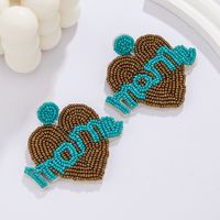 1 Pair Elegant Simple Style Letter Beaded Cloth Glass Ear Studs main image 3