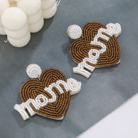 1 Pair Elegant Simple Style Letter Beaded Cloth Glass Ear Studs main image 8