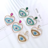 1 Pair Hip-Hop Exaggerated Modern Style Devil's Eye Heart Shape Hollow Out Inlay Alloy Rhinestones Drop Earrings main image 1