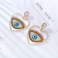 1 Pair Hip-Hop Exaggerated Modern Style Devil's Eye Heart Shape Hollow Out Inlay Alloy Rhinestones Drop Earrings main image 4
