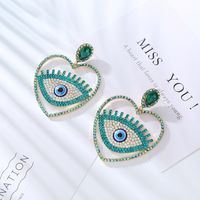 1 Pair Hip-Hop Exaggerated Modern Style Devil's Eye Heart Shape Hollow Out Inlay Alloy Rhinestones Drop Earrings main image 3