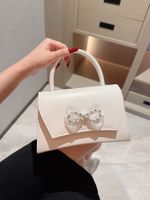 Women's Pu Leather Solid Color Elegant Bowknot Magnetic Buckle Evening Bag main image 4
