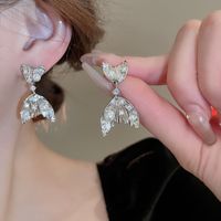 1 Pair Casual Simple Style Fish Tail Inlay Copper Pearl Zircon Drop Earrings main image 1