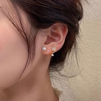 1 Pair Elegant Lady Simple Style Flower Inlay Zinc Alloy Artificial Pearls Opal Ear Studs sku image 1