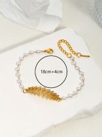 304 Stainless Steel Imitation Pearl 18K Gold Plated Elegant Lady Classic Style Beaded Plating Four Leaf Clover Angel Palm Artificial Pearls Bracelets main image 5