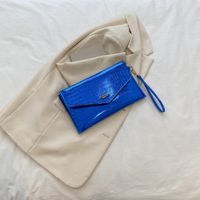 Women's Medium Pu Leather Solid Color Streetwear Magnetic Buckle Envelope Bag sku image 2