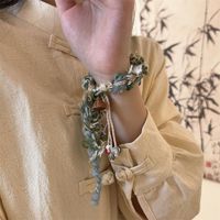 Hawaiian Ethnic Style Sweet Geometric Flower Synthetic Yarn Resin Metal Beaded Drawstring Tassel Women's Bracelets main image 4