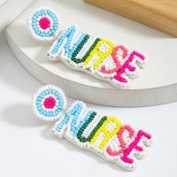 1 Pair Simple Style Classic Style Letter Plating Inlay Seed Bead Rhinestones Drop Earrings main image 6