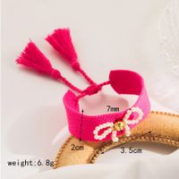 Simple Style Bow Knot Cloth Shell Pearls Copper Beaded Knitting Women's Wristband main image 2