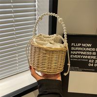 Women's Medium Straw Solid Color Vacation Beach Pearls Weave String Straw Bag main image 2