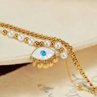 304 Stainless Steel IG Style Vintage Style Beaded Pearl Inlay Devil's Eye Shell Double Layer Necklaces main image 5