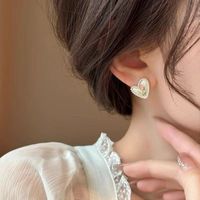 1 Pair IG Style Sweet Heart Shape Flower Inlay Alloy Pearl Silver Plated Ear Studs main image 1