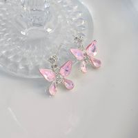 1 Pair Cute Lady Sweet Heart Shape Butterfly Inlay Artificial Pearl Copper Zircon Ear Studs sku image 2