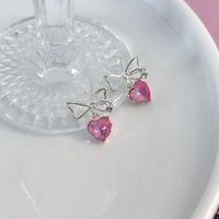 1 Pair Cute Lady Sweet Heart Shape Butterfly Inlay Artificial Pearl Copper Zircon Ear Studs sku image 1