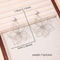 1 Pair Streetwear Elegant Flower Hollow Out Inlay 201 Stainless Steel Zinc Alloy Artificial Pearls Drop Earrings main image 3