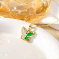 Copper K Gold Plated Elegant Simple Style Plating Inlay Four Leaf Clover Butterfly Fish Tail Rhinestones Pendant Necklace main image 9