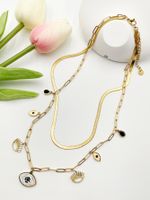 304 Stainless Steel Gold Plated Vacation Tropical Sweet Layered Pearl Inlay Sun Devil's Eye Zircon Layered Necklaces main image 4