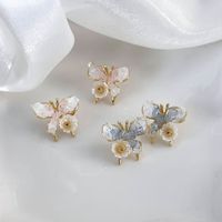 1 Pair Modern Style Sweet Flower Butterfly Inlay Alloy Rhinestones Gold Plated Ear Studs main image 1