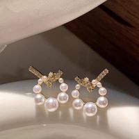 1 Pair Princess Pastoral Commute Circle Knot Inlay Copper Pearl Zircon 18K Gold Plated Ear Studs main image 1