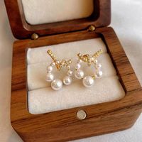 1 Pair Princess Pastoral Commute Circle Knot Inlay Copper Pearl Zircon 18K Gold Plated Ear Studs main image 5