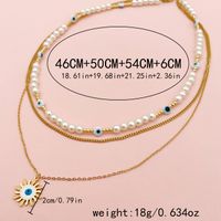 304 Stainless Steel Gold Plated Vacation Tropical Sweet Layered Pearl Inlay Sun Devil's Eye Zircon Layered Necklaces main image 3