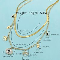 304 Stainless Steel Gold Plated Vacation Tropical Sweet Layered Pearl Inlay Sun Devil's Eye Zircon Layered Necklaces main image 2