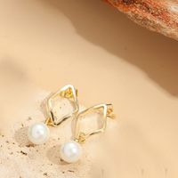 1 Pair Simple Style Heart Shape Inlay Copper Shell Pearls 14K Gold Plated Ear Studs sku image 1