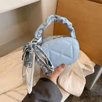 Women's Small Pu Leather Solid Color Cute Ribbon Oval Zipper Handbag sku image 5