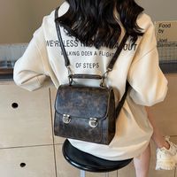 Women's Medium Pu Leather Solid Color Preppy Style Classic Style Lock Clasp Fashion Backpack main image video