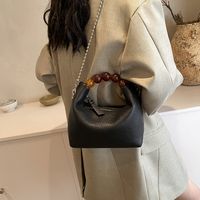 Women's Small Pu Leather Solid Color Elegant Classic Style Beading Pillow Shape Zipper Handbag main image 3
