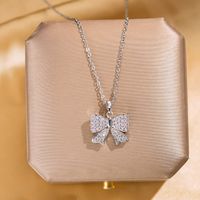 304 Stainless Steel Copper Elegant Lady Modern Style Inlay Letter Butterfly Lock Acrylic Zircon Pendant Necklace main image 9
