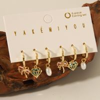 Copper 14K Gold Plated Casual Inlay Heart Shape Butterfly Bow Knot Artificial Pearls Zircon Ear Studs main image 1