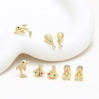 1 Pair XUPING Simple Style Commute Geometric Dolphin Skull Plating Inlay Copper Artificial Gemstones 18K Gold Plated Ear Studs main image 1