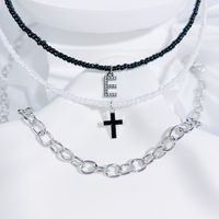 Einfacher Stil Klassischer Stil Kreuzen Brief Saatperle Kupferlegierung Perlen Inlay Künstlicher Kristall Paar Dreilagige Halskette sku image 5