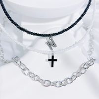 Einfacher Stil Klassischer Stil Kreuzen Brief Saatperle Kupferlegierung Perlen Inlay Künstlicher Kristall Paar Dreilagige Halskette sku image 14