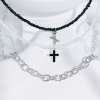 Einfacher Stil Klassischer Stil Kreuzen Brief Saatperle Kupferlegierung Perlen Inlay Künstlicher Kristall Paar Dreilagige Halskette sku image 24