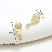 1 Pair XUPING Simple Style Commute Geometric Dolphin Skull Plating Inlay Copper Artificial Gemstones 18K Gold Plated Ear Studs main image 5